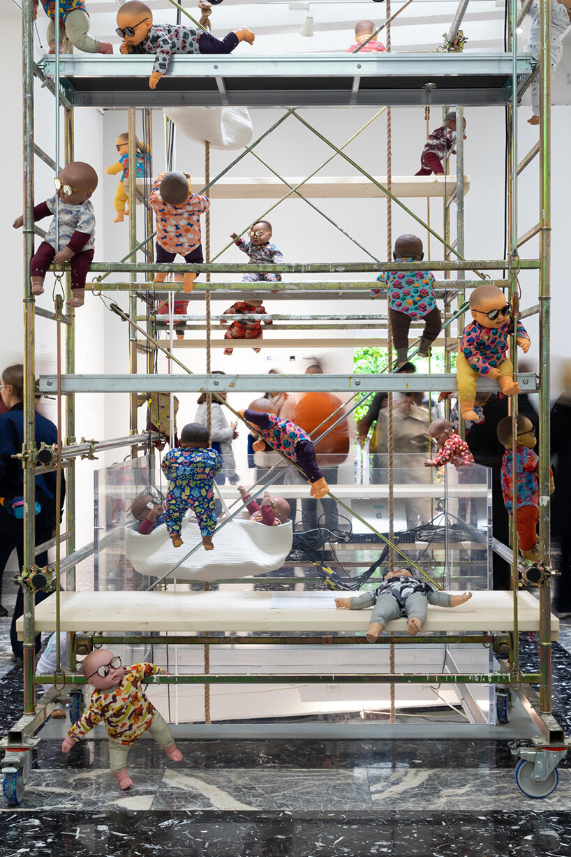 208 baby dolls animate japan pavilion in ei arakawa-nash's playful ode to care - 6