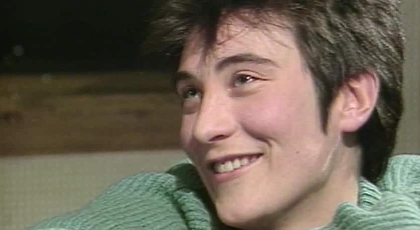 Smiling woman with short dark hair