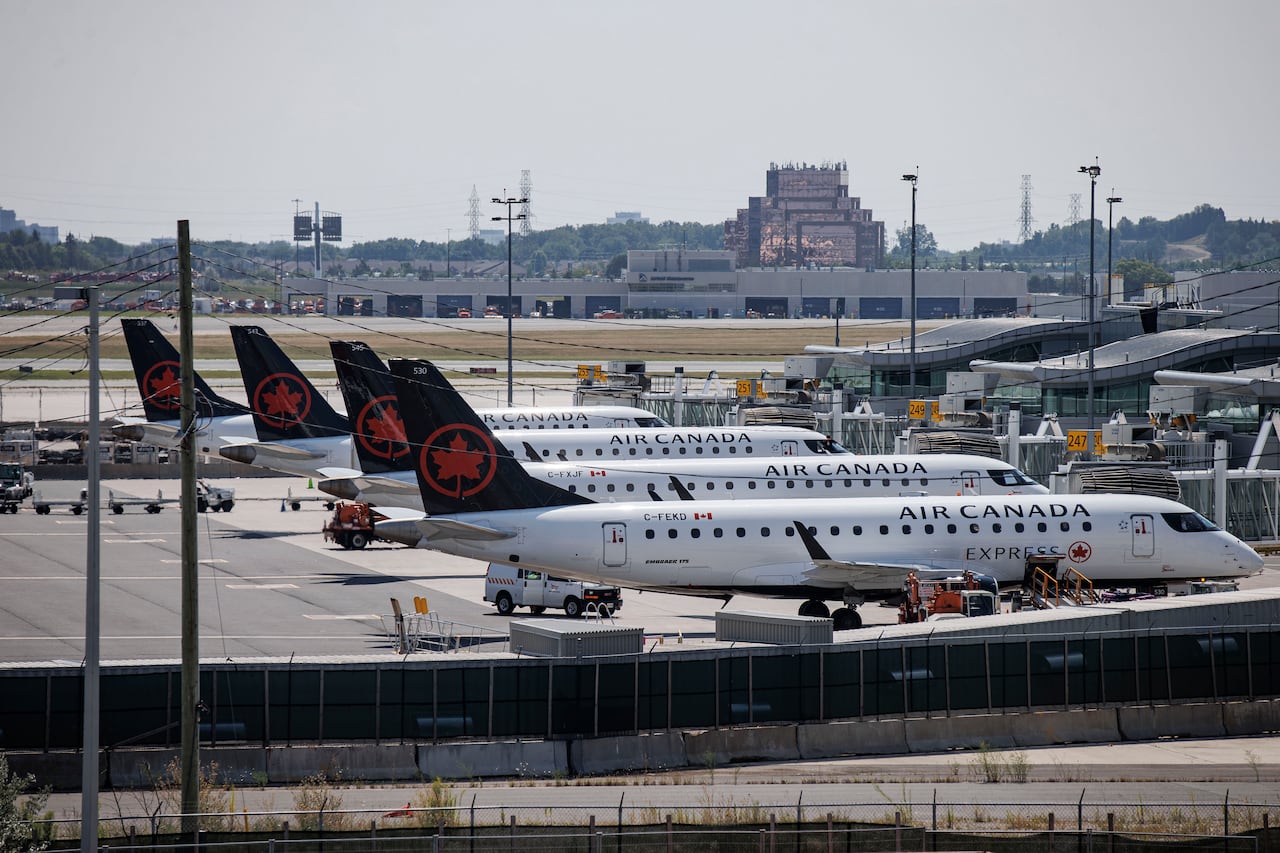 Travellers at Pearson airport, in Toronto, cope with disruptions from a looming Air Canada flight attendants strike on Aug. 15, 2025.
Default Caption