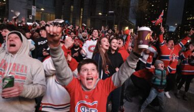 Fans outside the Bell Centre cheer a second-period goal by the Canadiens against the Sabres during Game 3 Sunday night.