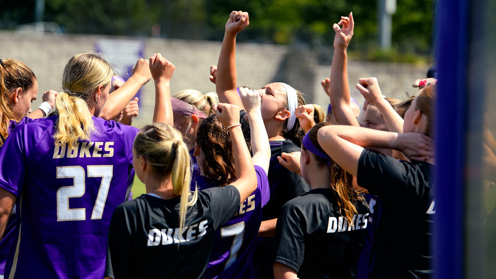 JMU Womens Soccer huddle during its game against Georgia Southern