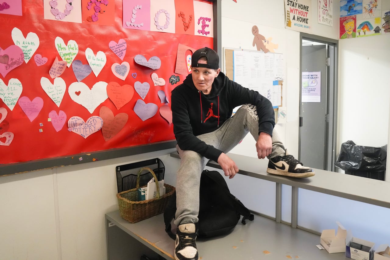 Person on a sitting on a counter with their legs up