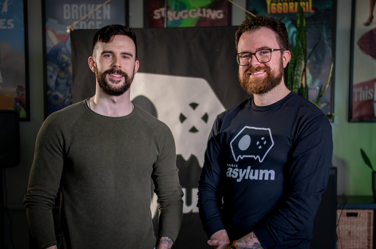 Two smiling bearded men