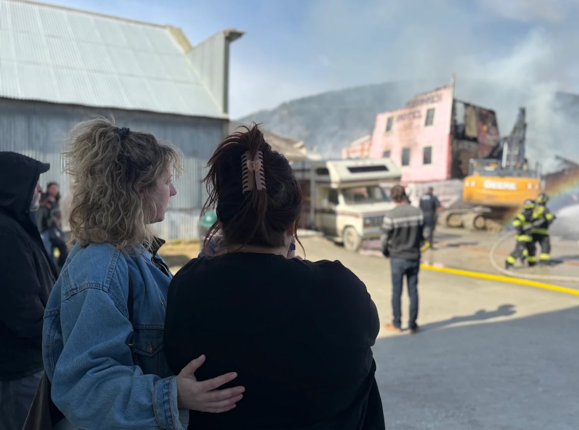 A crowd watches the fire at the Westminster Hotel in Dawson City on Sunday morning.