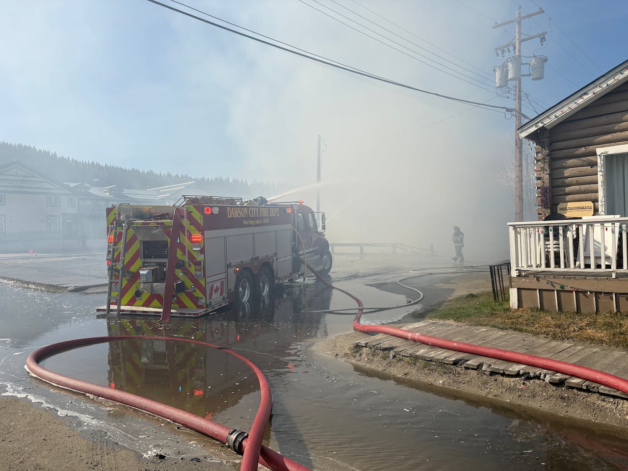 A fire truck battles the fire at the Westminster Hotel on Sunday morning.