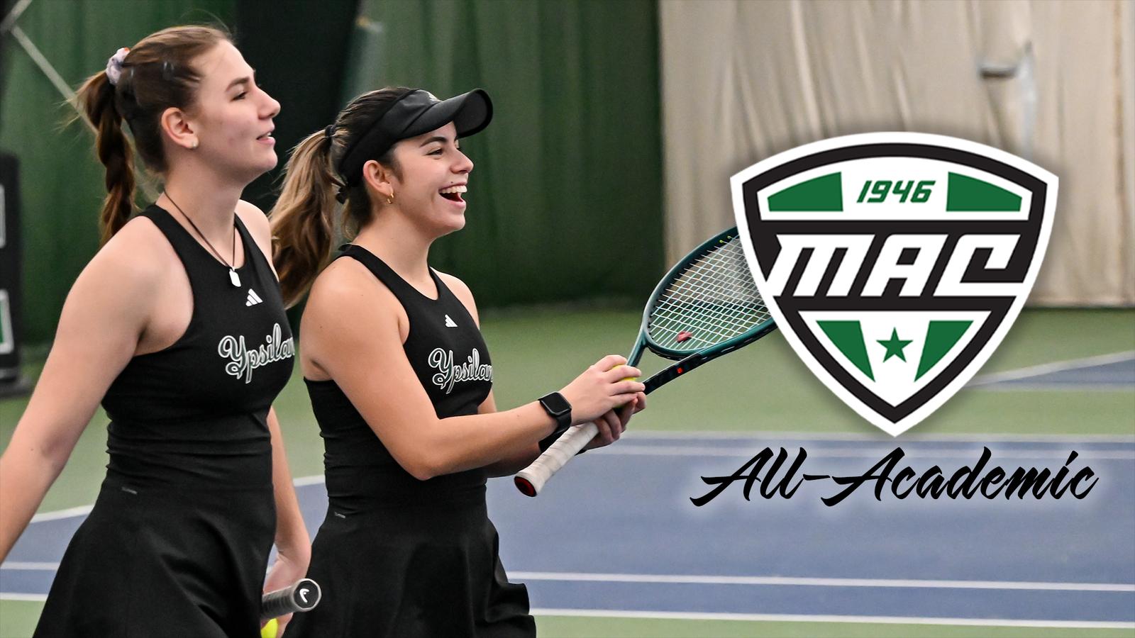 Iva Daneva and Regina Mendez Carreno pose together in front of an EMU banner with the CSC Academic All-District logo appearing to the left of the image