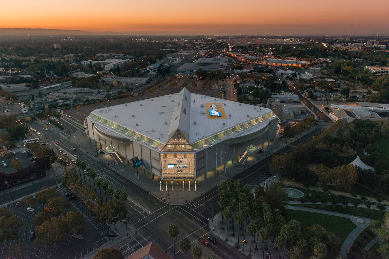 The exterior of an arena is shown.