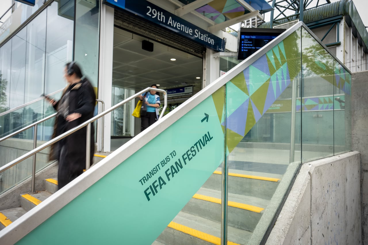 Branding and pathways for the FIFA fan festival are pictured at a SkyTrain and bus station.