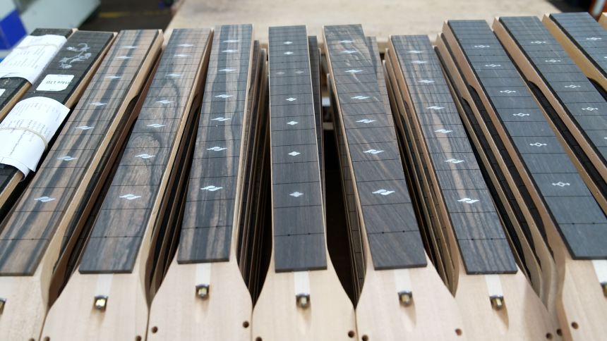 Ebony's high density and durability makes it ideal for guitar fretboards.