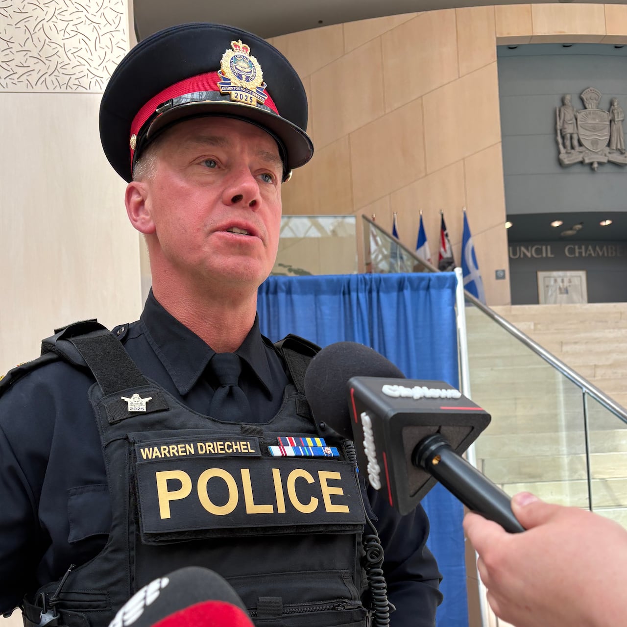 A man in police tactical wear.