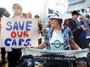 Vancouver Whitecaps supporters rally to keep the team in Vancouver, outside the Vancouver Convention Centre which is hosting the FIFA Congress, in Vancouver on April 30, 2026. 
