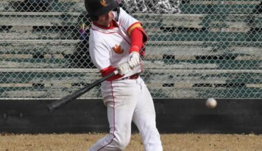 Dinos upset Coyotes in first game of CCBC championships.