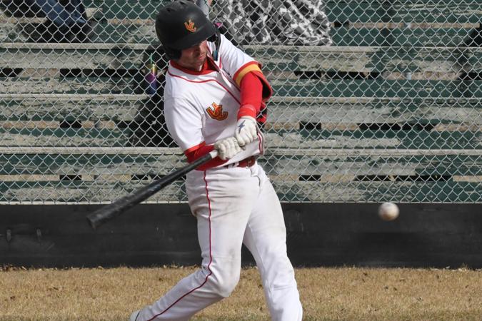 Dinos upset Coyotes in first game of CCBC championships.
