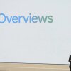 Liz Reid, Google's head of search, speaks at a Google I/O event in Mountain View, California, on May 14, 2024. Reid is standing on the right side of the frame, and behind her is a giant backdrop that says "AI Overviews" on it.