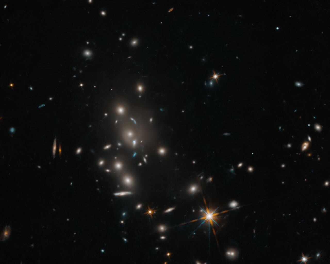 Hubble Captures Galaxy Cluster - NASA Science