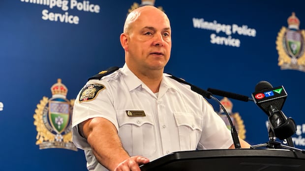 Police seize 21 loaded handguns, drugs, and cash from apartment