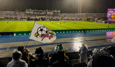 A spectator at the Suwon Sports Complex waves a flag bearing the emblem of North Korea’s Naegohyang Women’s Football Club during the team’s semifinal match against South Korea