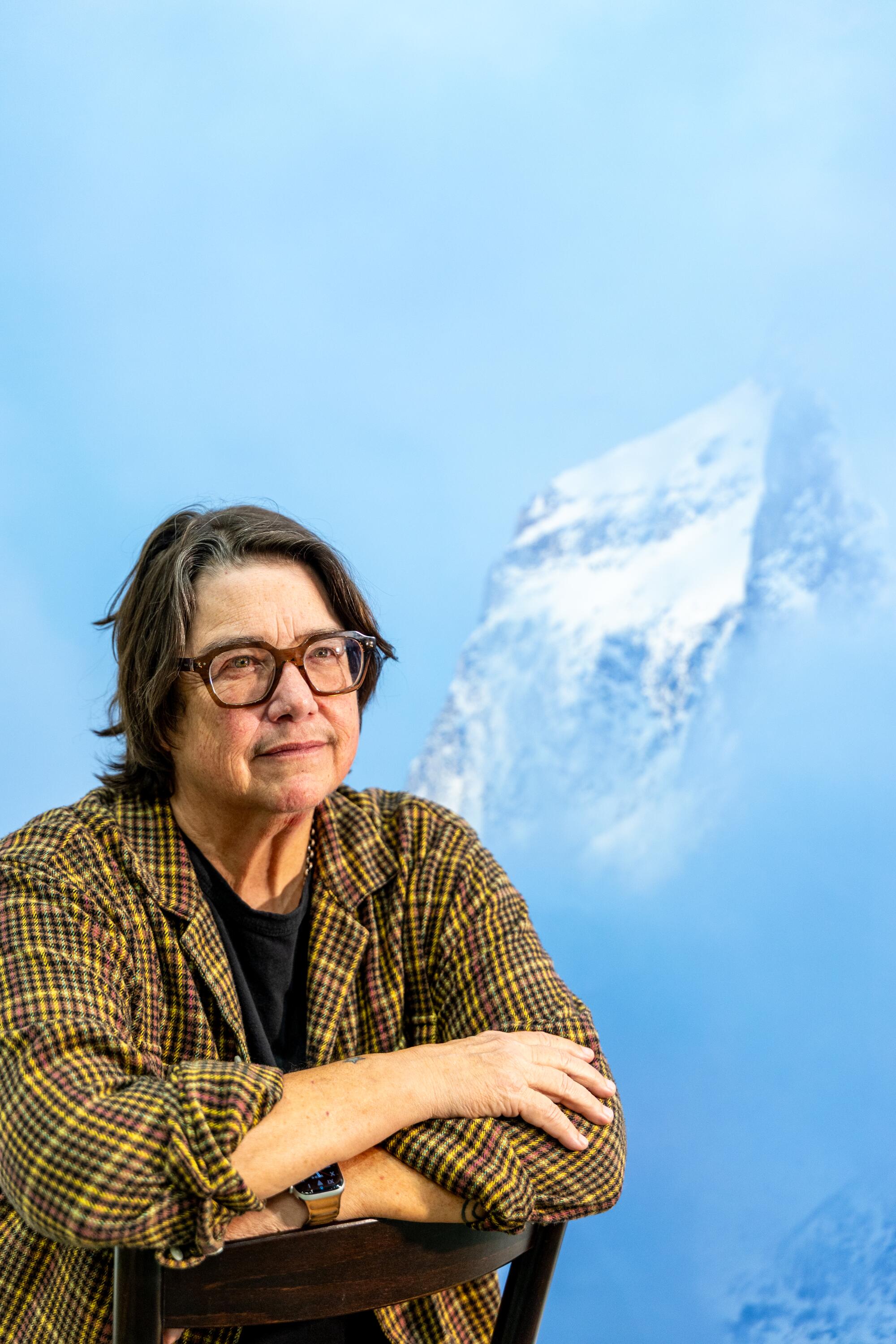 An artist with one of her photographs.