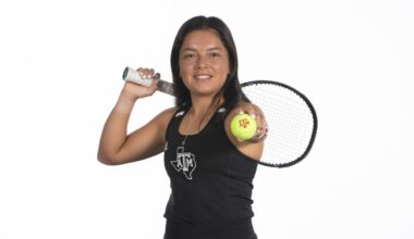 Women's TEnnis with the national championship trophy