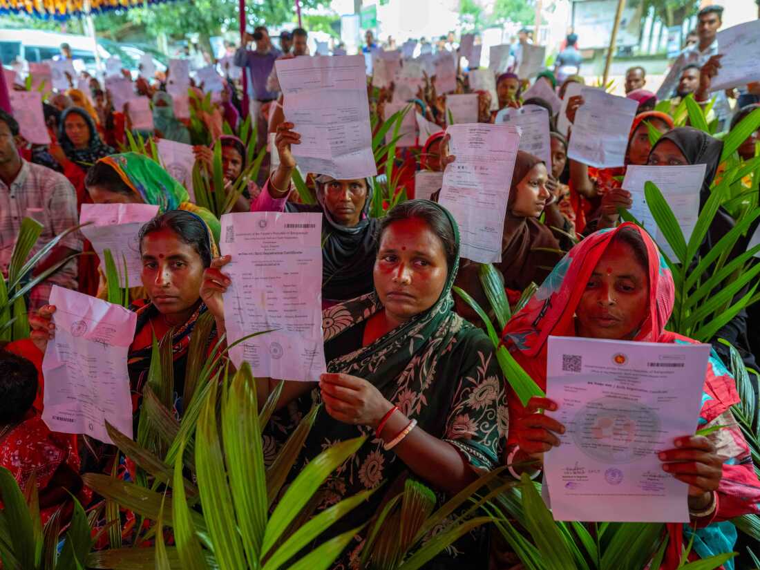 July 1, 2025. Sirajganj, Bangladesh Mothers who were previously excluded from the civil registry hold up newly issued birth certificates, both their own and those of their family members, during a civil registration drive in Dhamainagar Union. The event was organized to help residents enroll in a government food assistance program. These efforts are part of Bangladesh’s nationwide social safety net initiative, which aims to improve civil registration coverage. Photo credit: Juan Arredondo