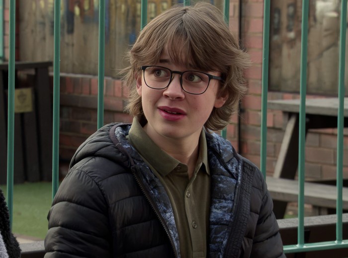 19_02_coro_will_sam_01 Sam Blakeman in the park in a scene from Coronation Street