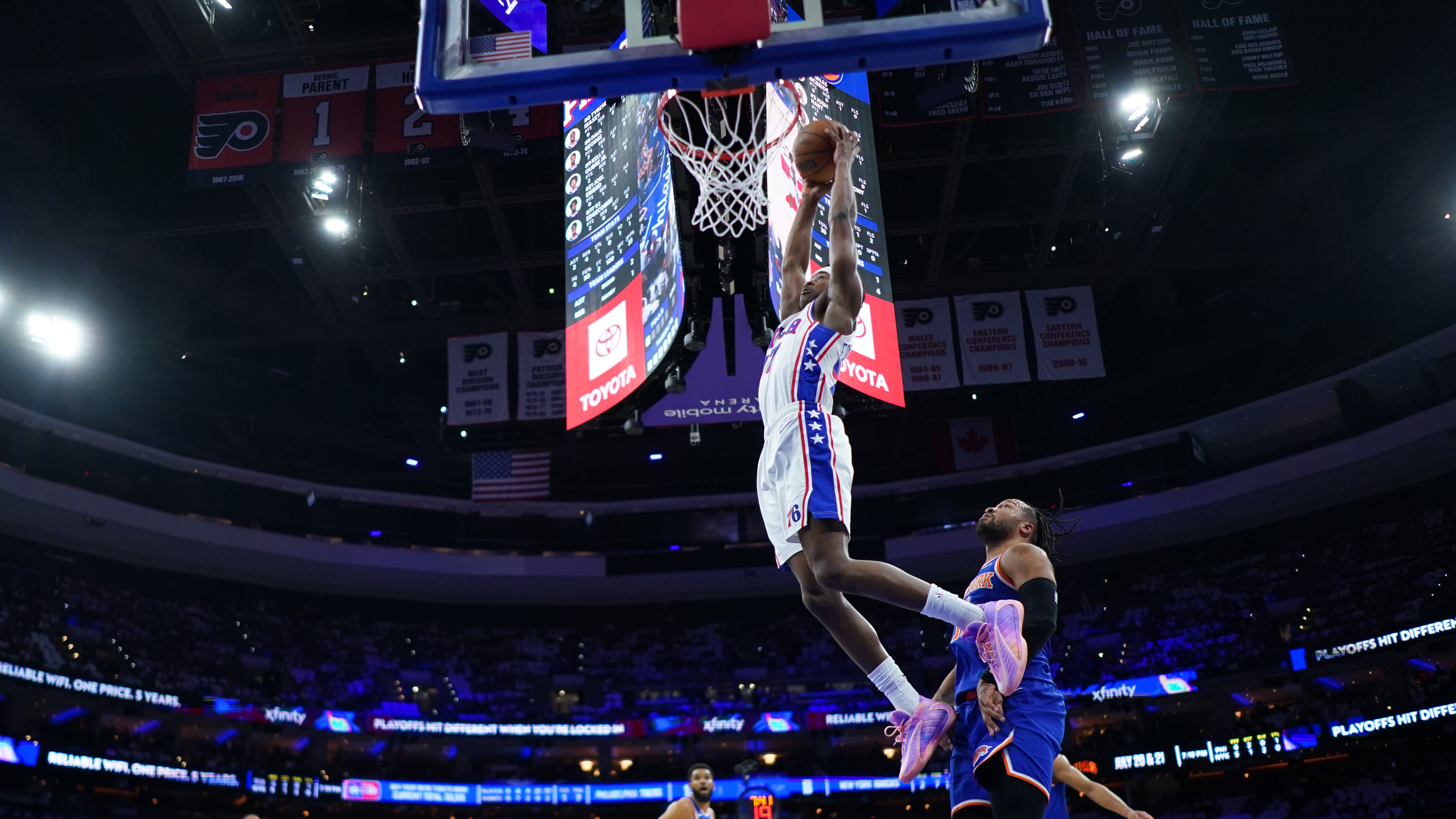 Philadelphia 76ers' Vj Edgecombe goes up for a dunk past New York Knicks' Jalen Brunson during the first half of Game 3 in a second-round NBA basketball playoff series