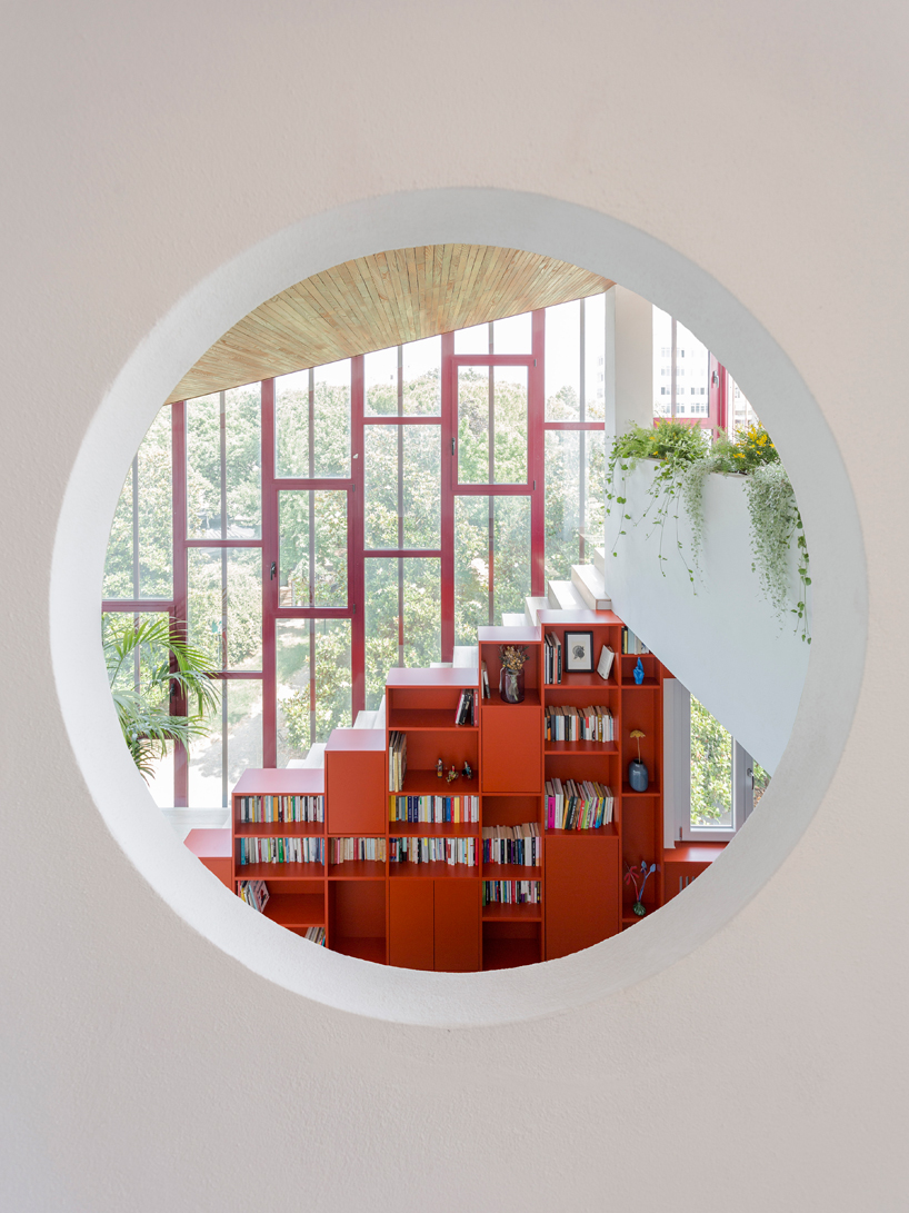 pop colors animate geometric interiors within renovated 1960s apartment in italy - 3