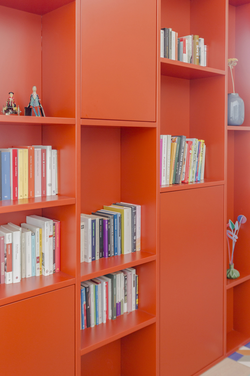 pop colors animate geometric interiors within renovated 1960s apartment in italy - 5
