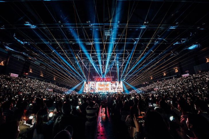 Fans cheer as rock band DAY6 hosts a solo concert in Hong Kong, Jan. 18, as part of its 'DAY6 10th Anniversary Tour 'The DECADE,'' celebrating the band's 10th debut anniversary. Courtesy of JYP Entertainment