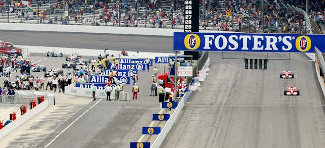 Drivers with Michelin tyres are seen driving in to the pits 2005 US GP