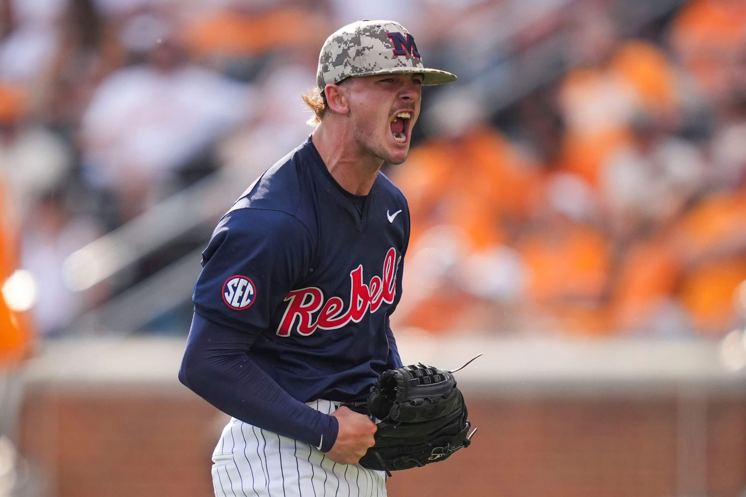 Cade Townsend celebrates while pitching.