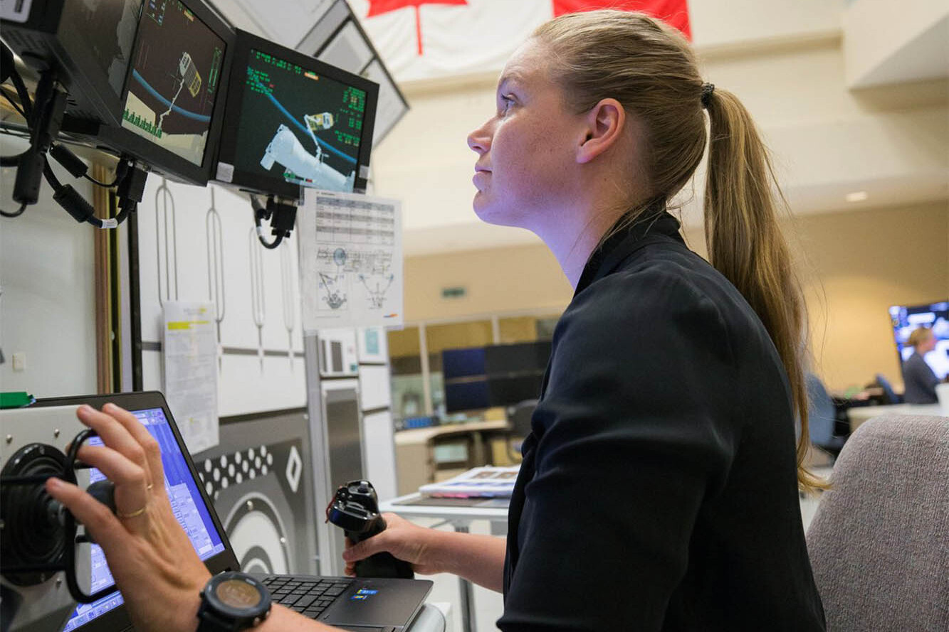 An astronaut takes part in robotics training. 