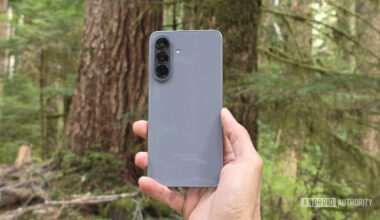Samsung Galaxy A57 review image showing the phone's back in an outdoor setting