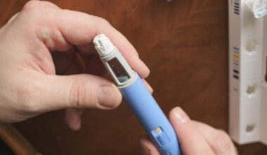 Person preparing a semaglutide injection pen.