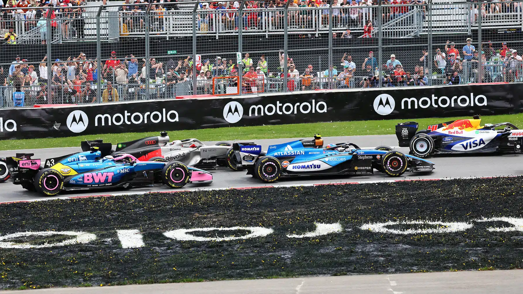 Arvid Lindblad (Racing Bulls-Ford), Carlos Sainz Jr (Williams-Mercedes), Nico Hulkenberg (Audi) and Franco Colapinto (Alpine-Mercedes) in the first corner after the start of the sprint race before the 2026 Canadian Grand Prix