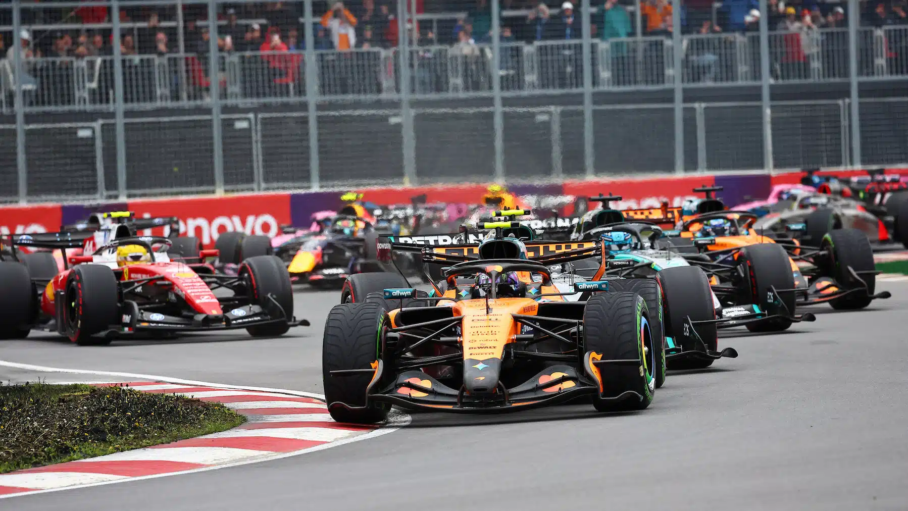 Lando Norris (McLaren-Mercedes) leads the field into the first corner after the start of the 2026 Canadian Grand Prix