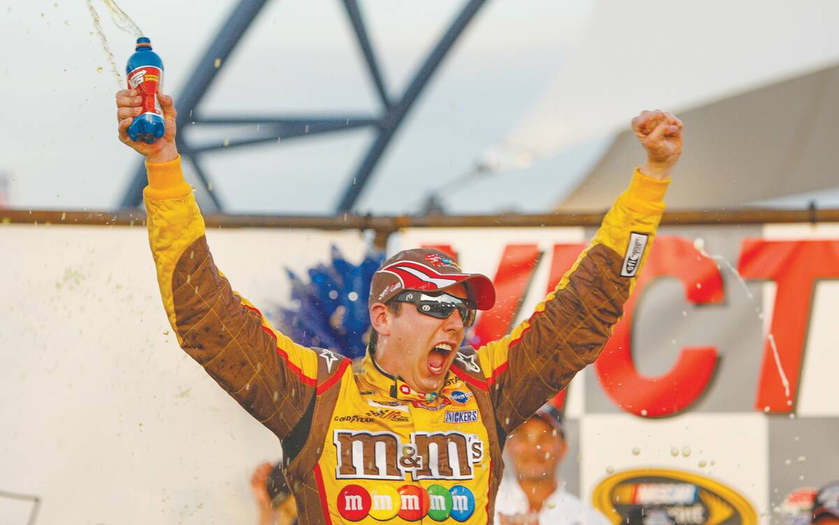 Kyle Busch celebrates after winning the NASCAR Shelby 427 race at the Las Vegas Motor Speedway ...