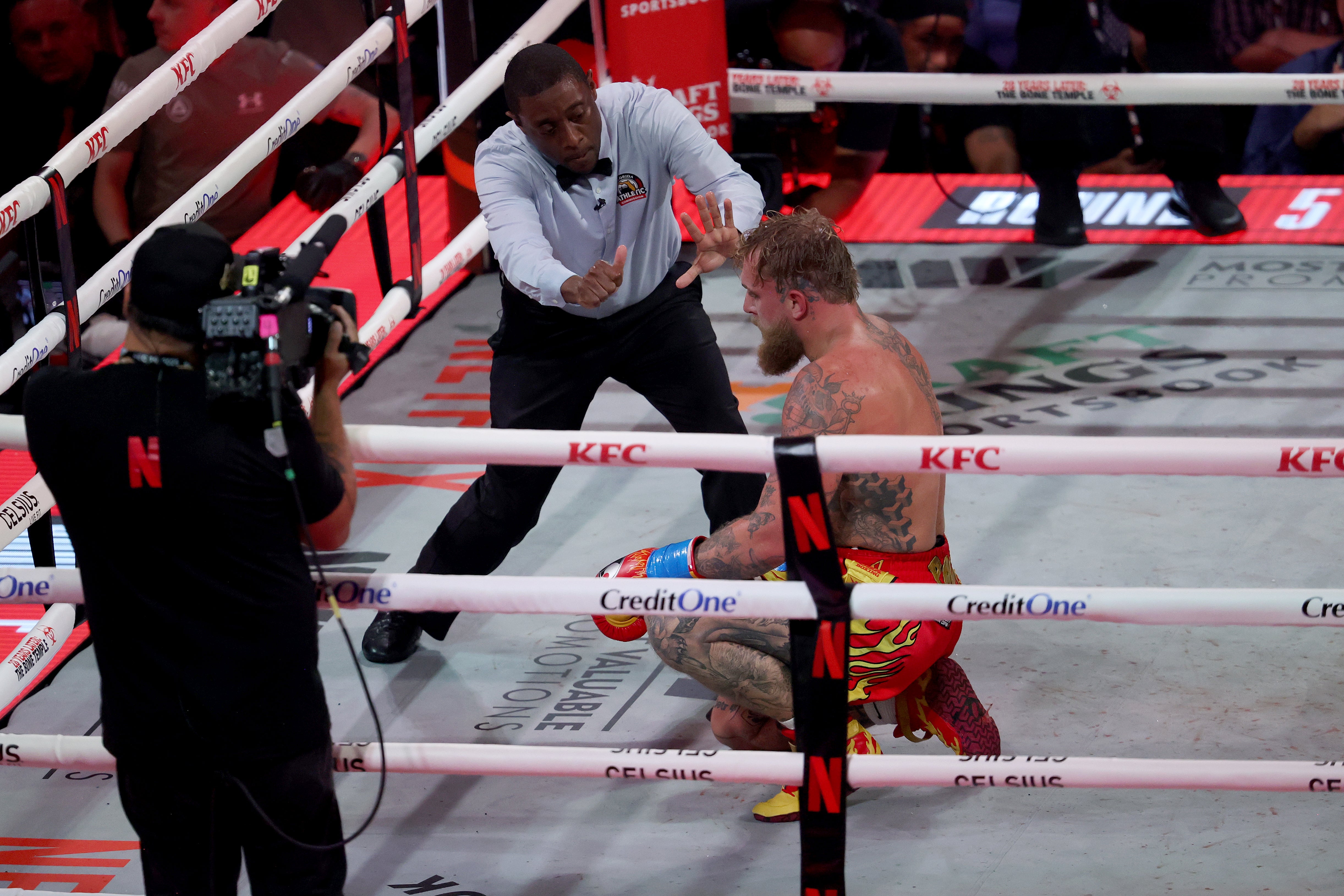 Jake Paul (right) during his stoppage loss to Anthony Joshua in December