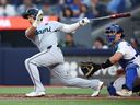 Javier Sanoja of the Miami Marlins hits a double in the fifth inning against the Toronto Blue Jays at Rogers Centre on Monday, May 25, 2026, in Toronto. 