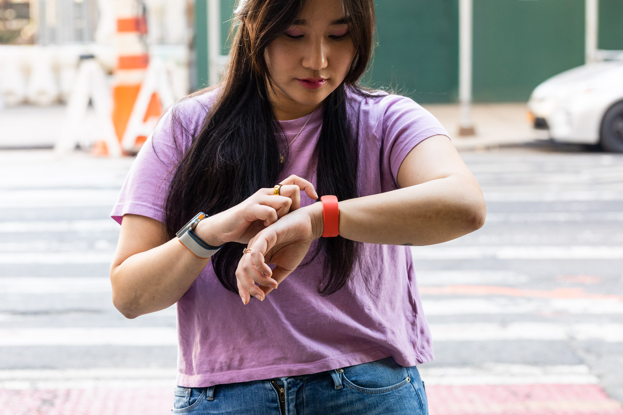 Person looking at Fitbit Charge 6 on their wrist.