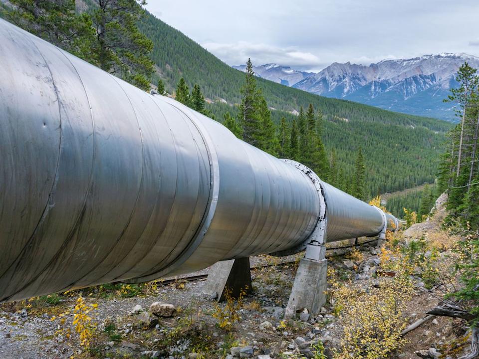 Pipeline funnelling water to an hydro power plant near Canmore, Alberta, Canada