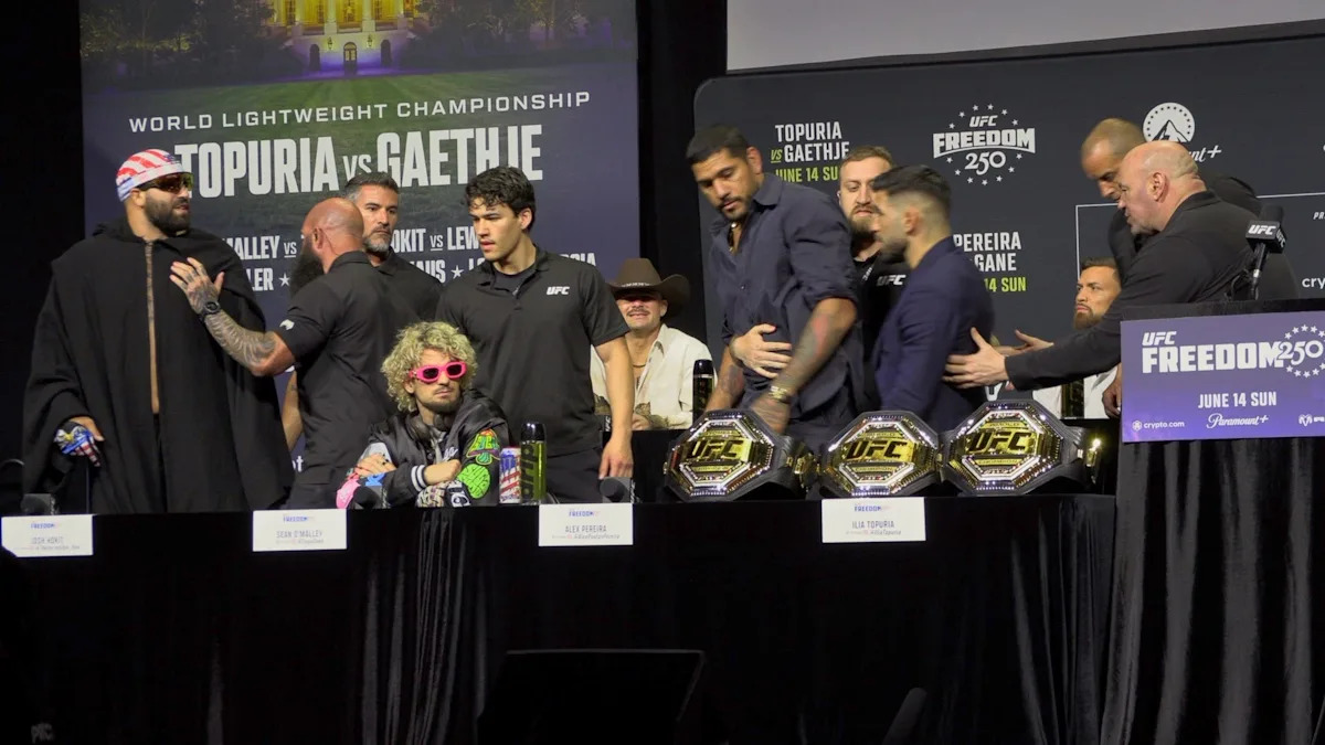 Video: Josh Hokit dragged off stage as Ilia Topuria defends Alex Pereira