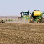 Seed goes into the ground in Manitoba's Interlake. Photo: Greg Berg