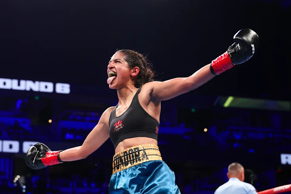 ANAHEIM, CALIFORNIA - MARCH 14: Gabriela Fundora celebrates her IBF WBA WBC & WBO World Flyweight Title victory over Viviana Ruiz at Honda Center on March 14, 2026 in Anaheim, California. (Photo by Cris Esqueda/Golden Boy/Getty Images)