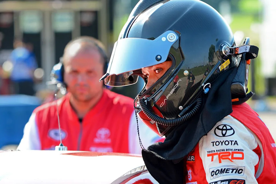 Natalie Decker of Eagle River, Wis., climbs into her car for qualifying for the ARCA Series Herr's 200 at Madison International Speedway in the Town of Rutland.