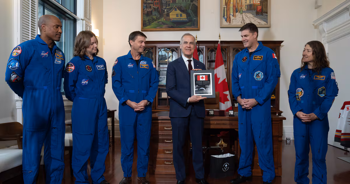 A coin and two special flags: PM Carney exchanges gifts with Artemis II crew - CTV News