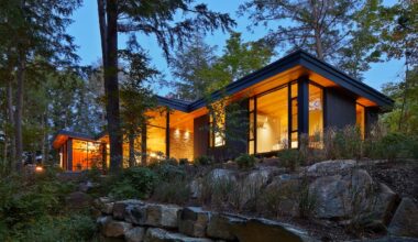 A hidden cottage opens to a shimmering lake