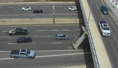 dump truck hits overpass on mississauga highway.