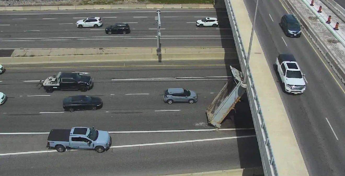 dump truck hits overpass on mississauga highway.