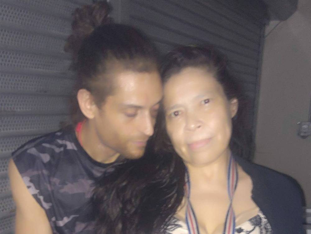 SUPPLIED
Tristan Fraser-Smith (left) died in a fire inside his partner Corinne Baxter’s eighth floor suite at 444 Kennedy St.